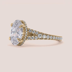 "Yellow gold 14K engagement ring featuring a split shank and hidden halo, perfect for timeless elegance and romance.