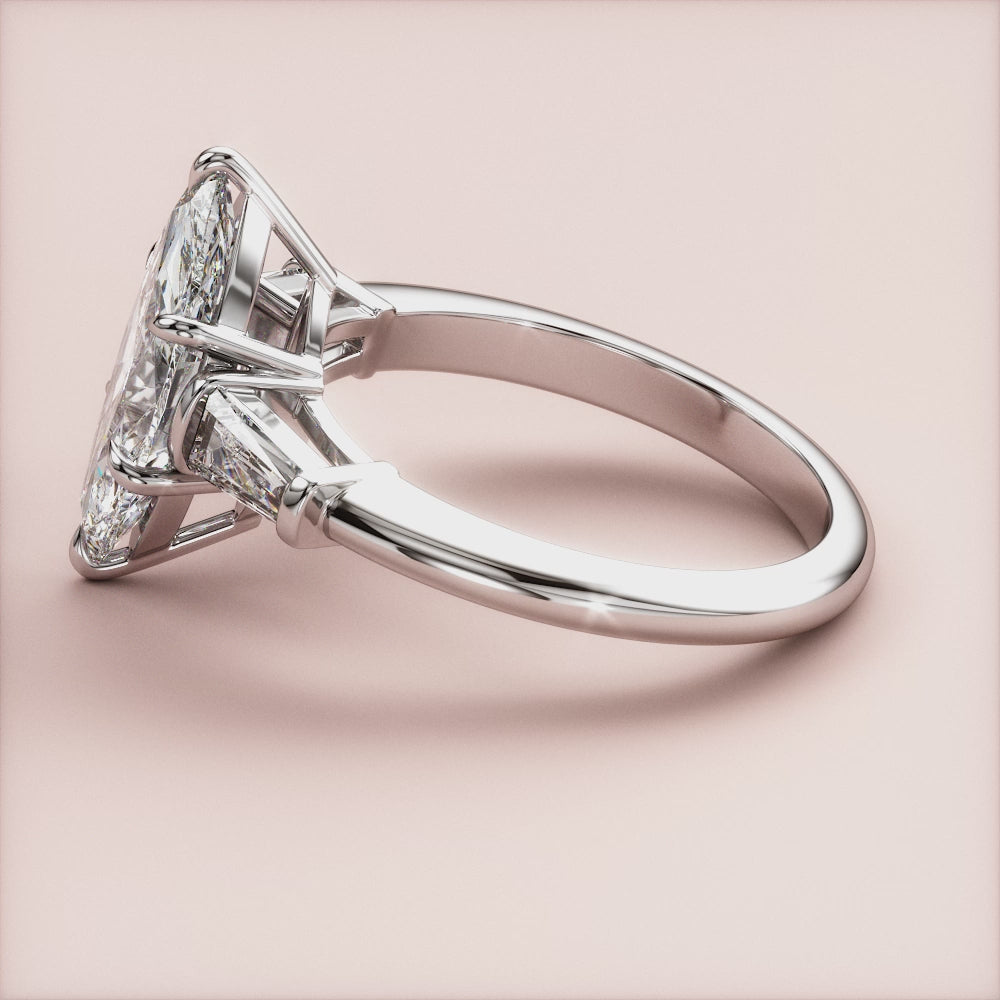 "Elegant 14K white gold marquise three-stone tapered baguette engagement ring, perfect for timeless romantic moments.|

#14KRecycledWhiteGold
#18KRecycledWhiteGold








#Platinum"
