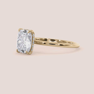 Elegant cushion-cut diamond ring in polished band, available in 14K, 18K, or platinum for timeless luxury and sparkle.
