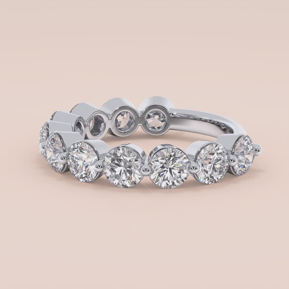 Elegant 14K or 18K white gold wedding band featuring a stunning row of round brilliant-cut diamonds, perfect for engagements. |
 #14KRecycledWhiteGold
 #18KRecycledWhiteGold
 
 
 
 
 #Platinum