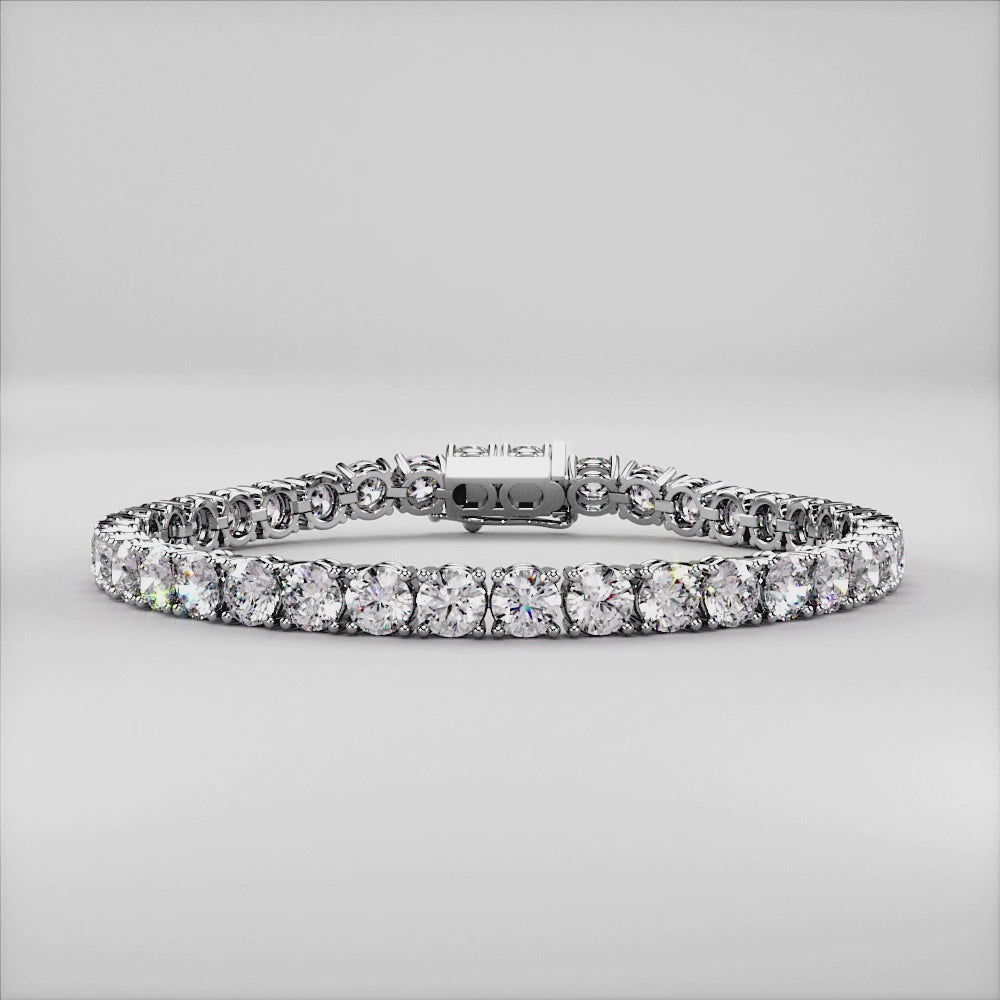 Diamond tennis bracelet on model featuring round brilliant cut diamonds in a secure four-prong setting. Available in 14K or 18K white, yellow, or rose gold. Timeless luxury and radiant sparkle for any occasion. |

#14KRecycledWhiteGold
#18KRecycledWhiteGold
#platinum
#14KRecycledYellowGold
#18KRecycledYellowGold
#14KRecycledRoseGold
#18KRecycledRoseGold