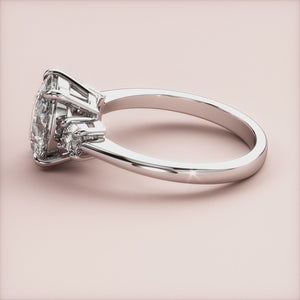 "14K white gold Vesta oval three-stone round engagement ring, featuring stunning sparkle and elegant design for lasting love.
