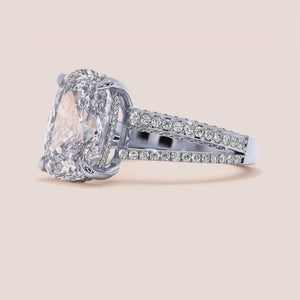 Stunning 14K White Gold Xena Cushion Hidden Halo Split Shank Engagement Ring with 3D Pave Detailing. Perfect for lasting love.