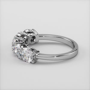 Elegant 14K or 18K gold or platinum wedding band featuring five round diamonds in classic prongs for a timeless look. 