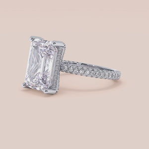 14K white gold pear-shaped engagement ring with hidden halo accents and 3D pave design, perfect for romantic proposals. 