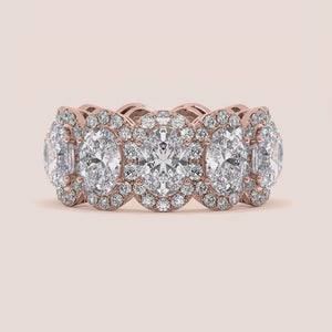 Elegant rose gold eternity band featuring marquise-cut diamonds, available in 14K and 18K gold or platinum.  Wedding band design. 