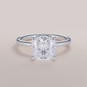 Elegant white gold solitaire engagement ring featuring a marquise-cut diamond, available in 14K, 18K, or platinum.
