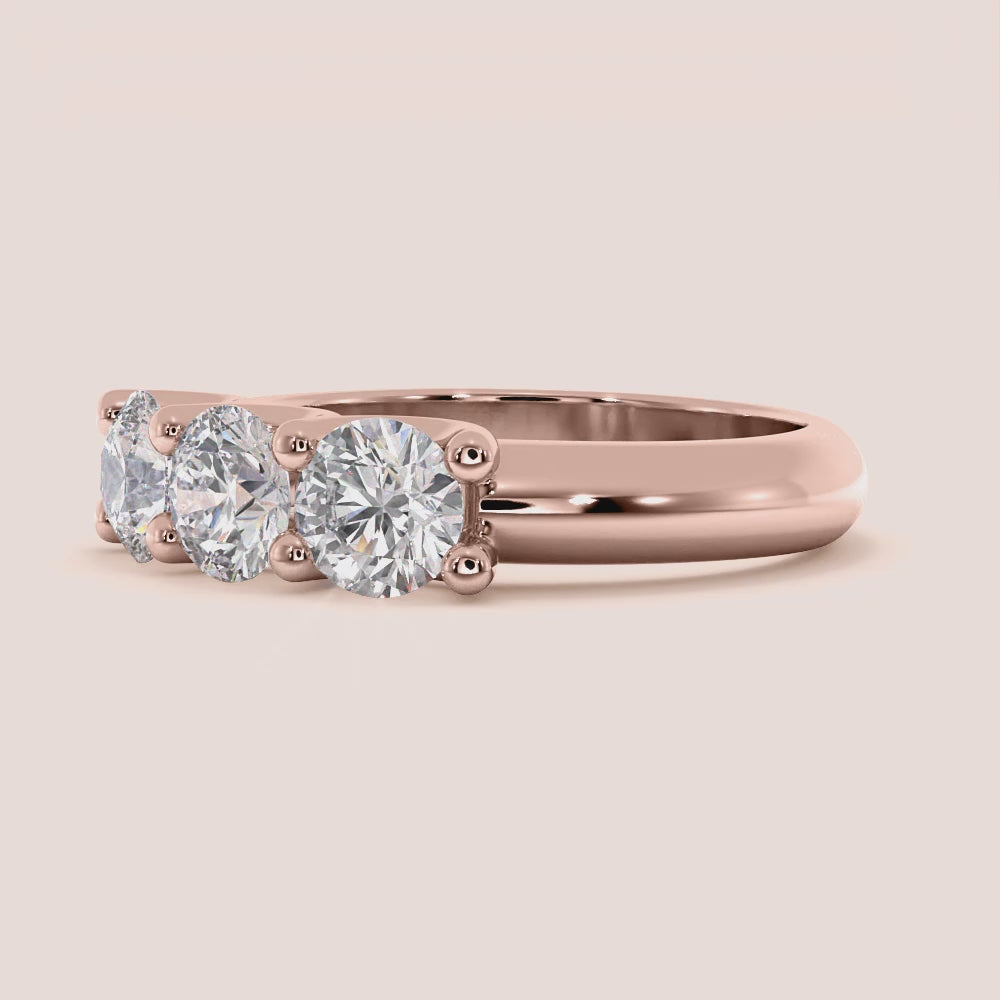 Rose gold wedding band featuring three stunning stones, available in 14K, 18K, and platinum for an elegant and timeless design. |
 
 
 
 
 #14KRecycledRoseGold
 #18KRecycledRoseGold