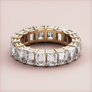 Elegant oval-shaped diamond engagement ring in 14K or 18K gold or platinum with hidden halo, perfect for proposals.