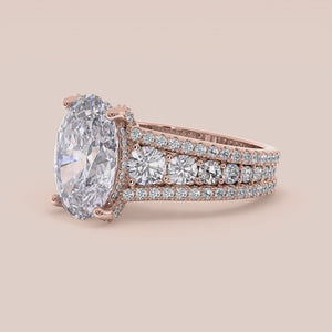 Rose Gold 14K/18K engagement ring featuring a hidden halo, oval accent stones, and a three-row band design for timeless elegance.