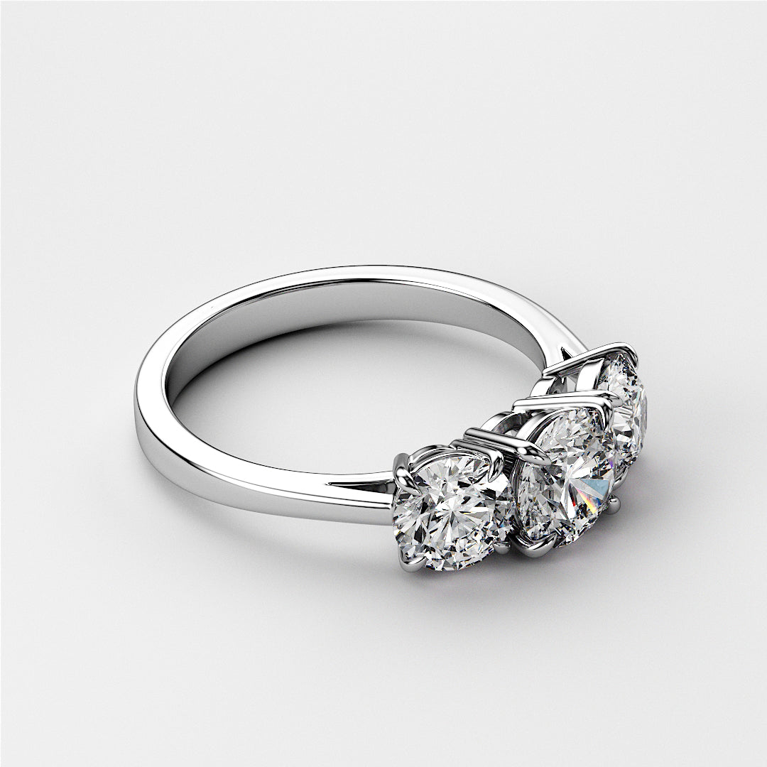 Elegant three-stone diamond wedding band in 14K/18K white gold or platinum, featuring round brilliant-cut diamonds.
