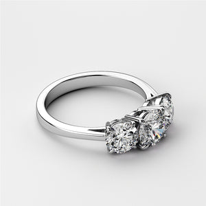 Elegant three-stone diamond wedding band in 14K/18K white gold or platinum, featuring round brilliant-cut diamonds.