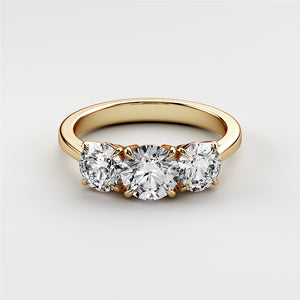 Elegant yellow gold three-stone wedding band featuring a stunning 0.70ct center, perfect for your timeless love story.