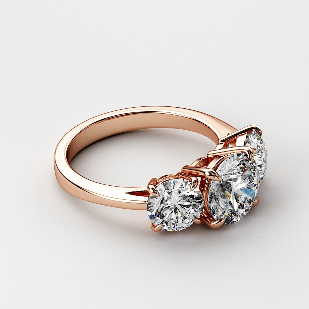 Elegant 14K Rose Gold Three-Stone Wedding Band with round diamonds, featuring a central brilliant gem and classic design. 