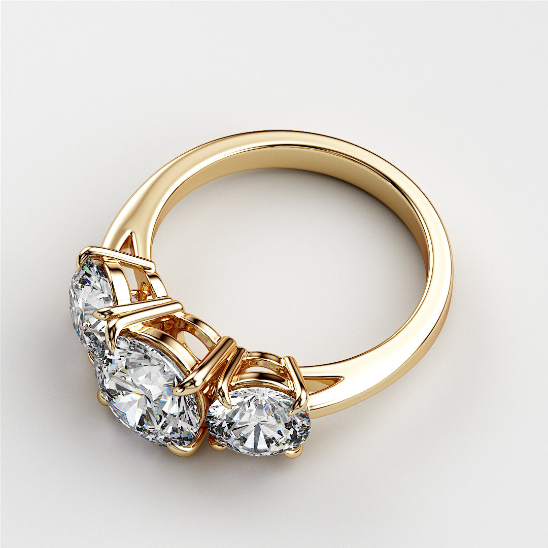 Elegant 14K or 18K gold wedding band featuring three stone round brilliant diamonds, perfect for engagements and special occasions. 