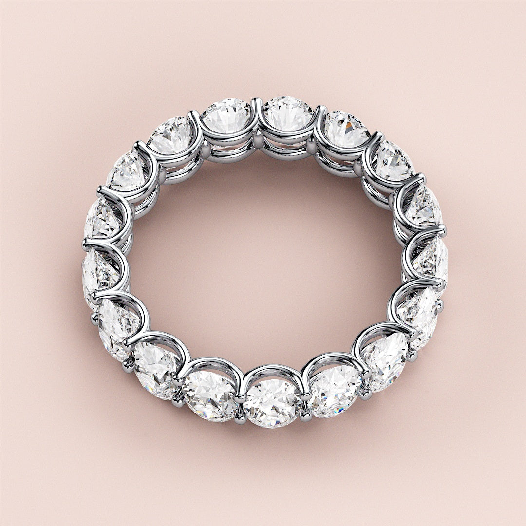 Stunning 14K or 18K white gold diamond eternity wedding band features round-cut diamonds for a dazzling effect. |
 #14KRecycledWhiteGold
 #18KRecycledWhiteGold
 
 
 
 
 #Platinum