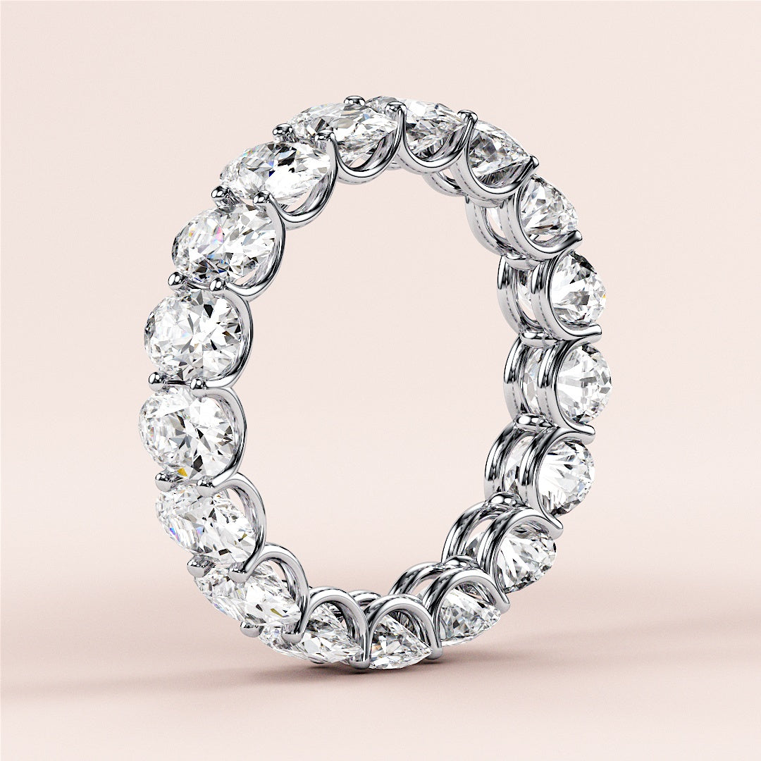 Elegant 14K or 18K gold eternity band with round-cut diamonds, perfect for weddings and special occasions. |
 #14KRecycledWhiteGold
 #18KRecycledWhiteGold
 
 
 
 
 #Platinum