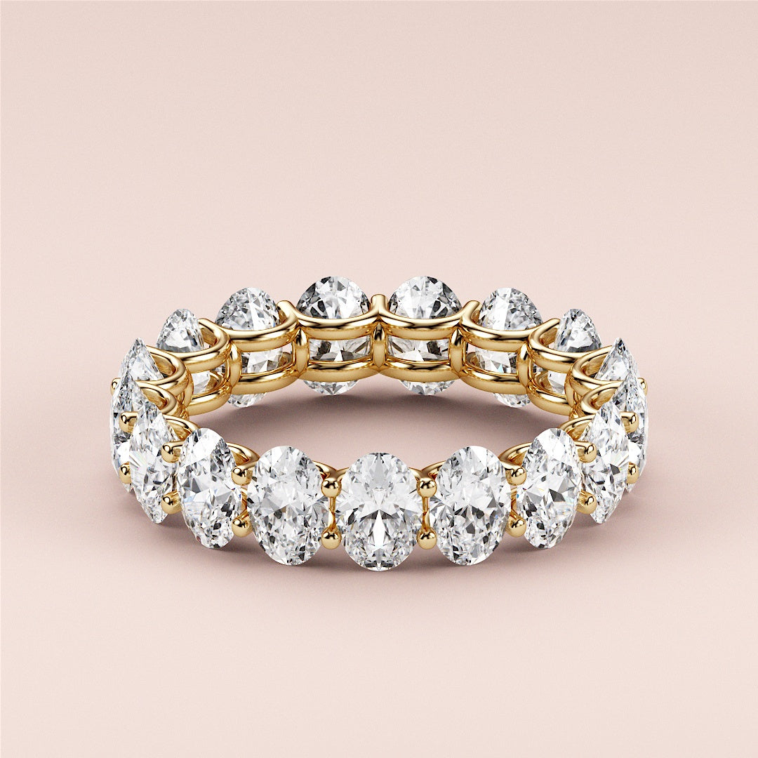 Worn-on-model 14K yellow gold eternity band with round brilliant diamonds, perfect for weddings and special occasions. |
 
 
 #14KRecycledYellowGold
 #18KRecycledYellowGold
