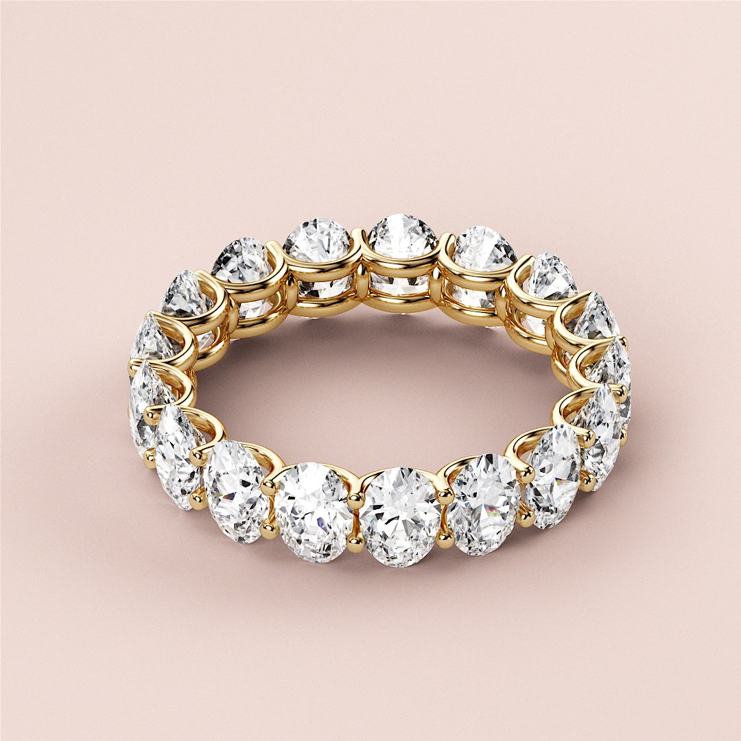 Elegant 14K or 18K gold eternity ring with round diamond cut stones, showcasing brilliant sparkle in a luxurious wedding band design. |
 
 
 #14KRecycledYellowGold
 #18KRecycledYellowGold
