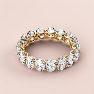Elegant 14K or 18K gold eternity ring with round diamond cut stones, showcasing brilliant sparkle in a luxurious wedding band design. 