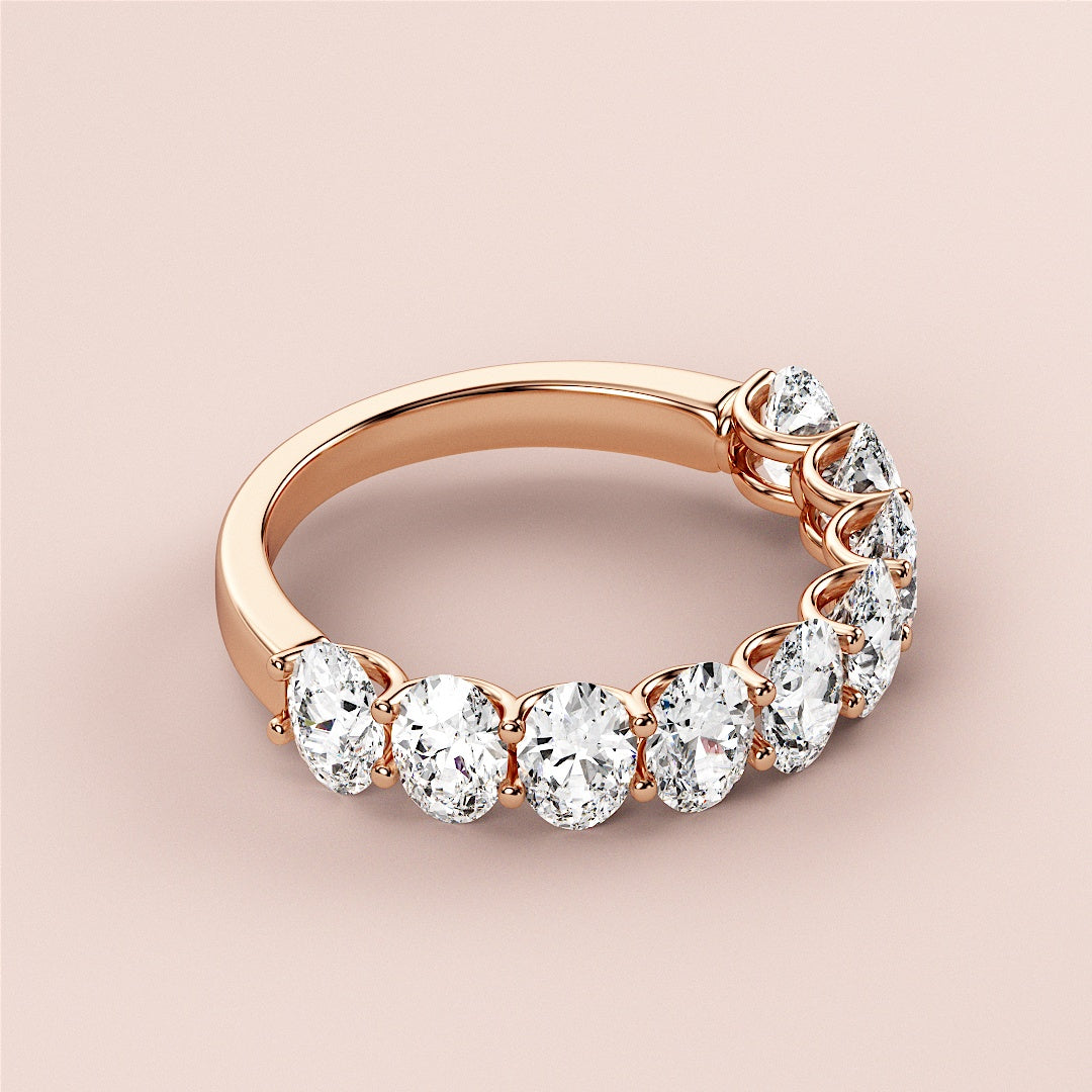 Elegant 14K rose gold wedding band featuring seven sparkling round diamonds in a prong setting, perfect for eternal love. |
 
 
 
 
 #14KRecycledRoseGold
 #18KRecycledRoseGold