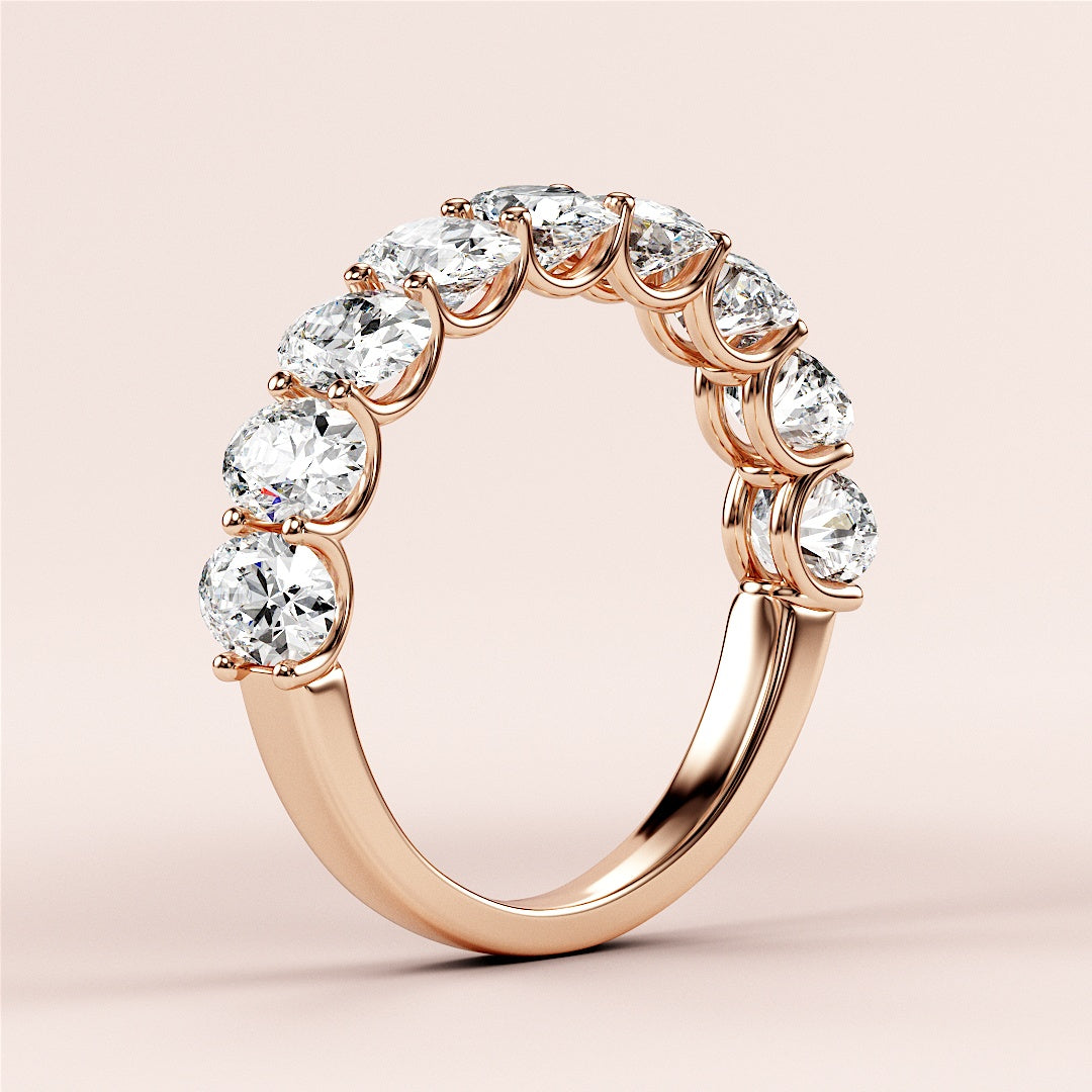 Elegant 14K or 18K rose gold wedding band featuring oval diamonds in a classic half eternity design. Perfect for everlasting love. |
 
 
 
 
 #14KRecycledRoseGold
 #18KRecycledRoseGold