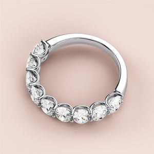 Elegant 14K/18K white gold diamond eternity ring, featuring round brilliant diamonds in a classic wedding band design. 