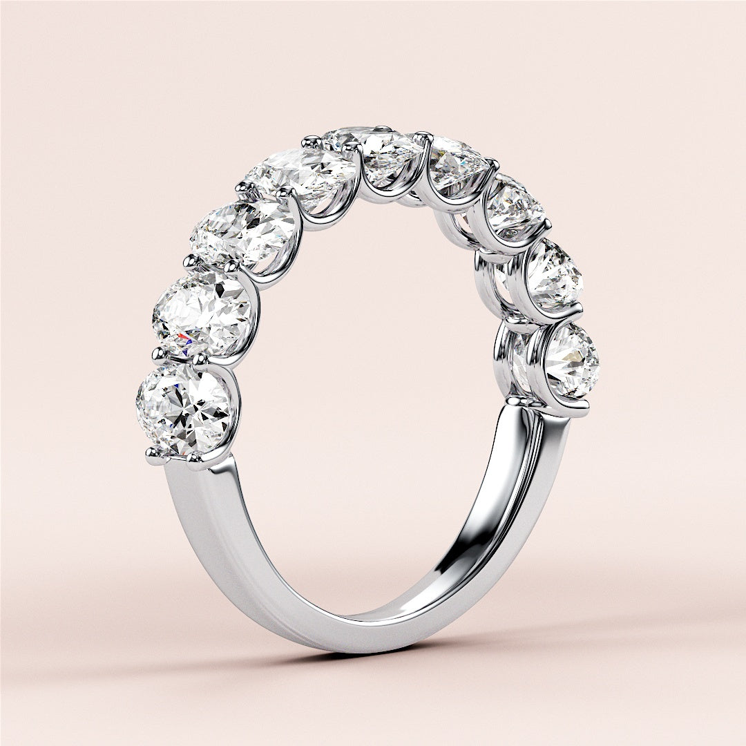 Elegant 14K-18K or platinum oval half-eternity wedding band with round brilliant-cut diamonds, perfect for special occasions. |
 #14KRecycledWhiteGold
 #18KRecycledWhiteGold
 
 
 
 
 #Platinum