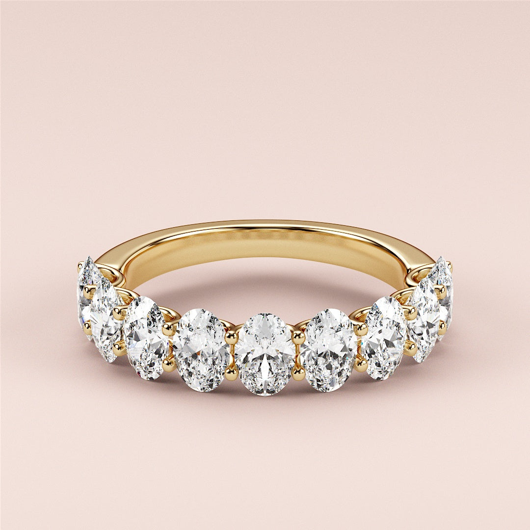 Gold eternity wedding band featuring round brilliant-cut diamonds; available in 14K, 18K, or platinum options. |
 
 
 #14KRecycledYellowGold
 #18KRecycledYellowGold
