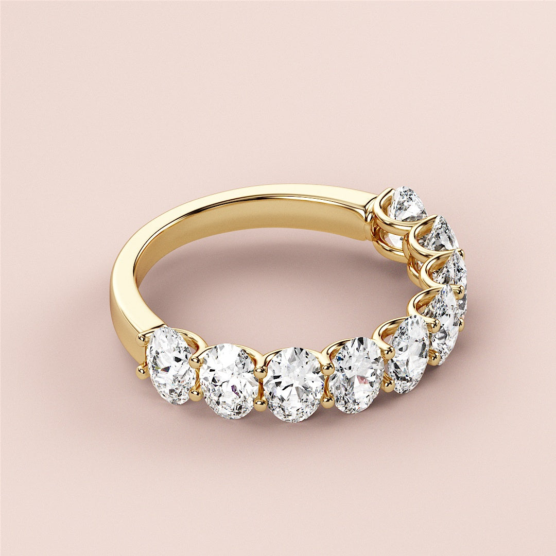 Elegant yellow gold wedding band featuring an oval half eternity design with round brilliant-cut diamonds in 14K/18K gold or platinum. |
 
 
 #14KRecycledYellowGold
 #18KRecycledYellowGold