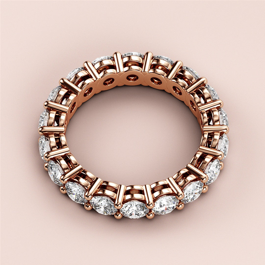 14K rose gold eternity band set with round brilliant-cut diamonds, perfect for wedding or anniversary celebrations. |
    
 #14KRecycledRoseGold
 #18KRecycledRoseGold