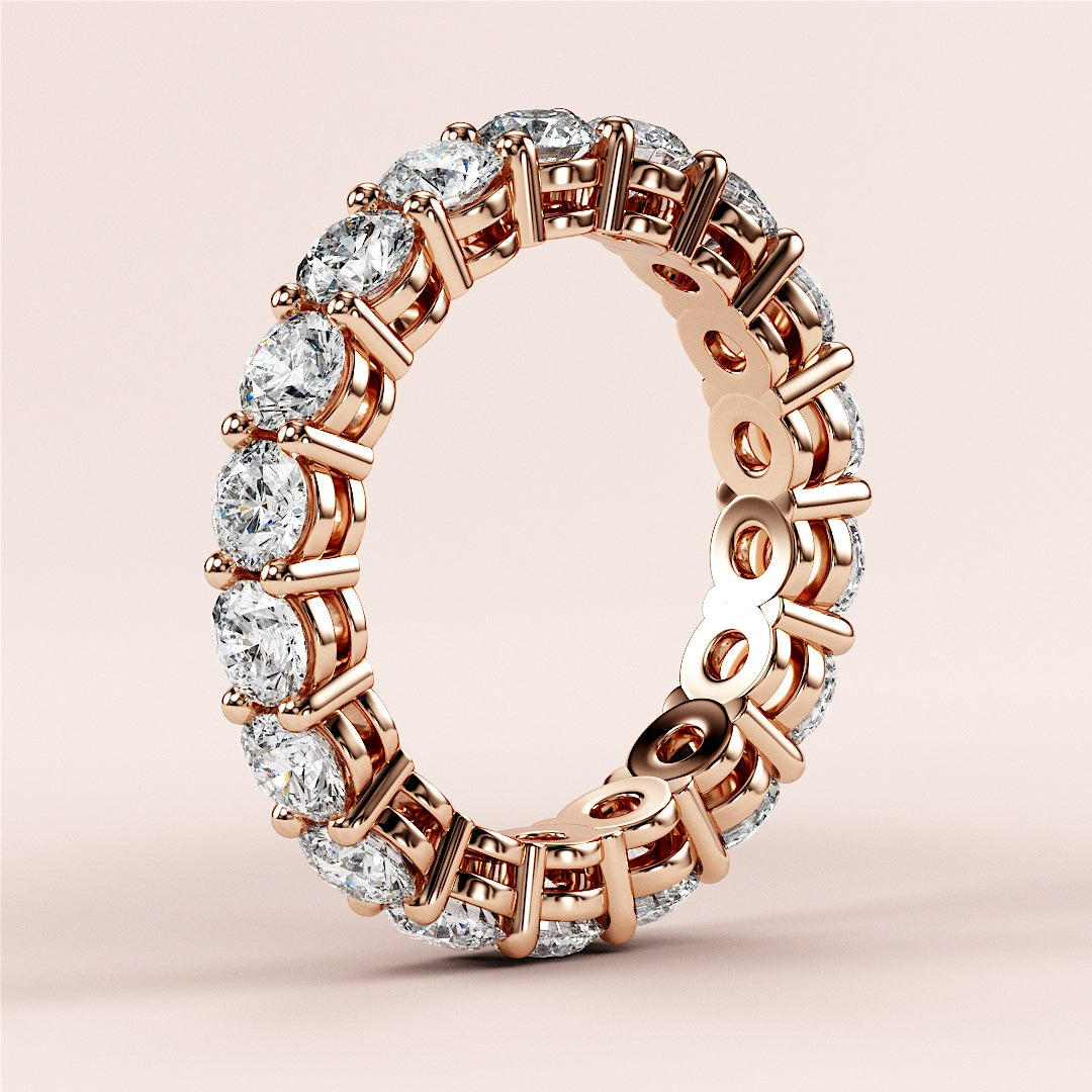 Stunning 14K/18K Rose Gold wedding band with round brilliant diamonds in prong setting, perfect for any special occasion. 