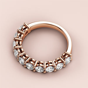 Elegant rose gold three-quarter eternity wedding band featuring brilliant round-cut diamonds, available in 14K, 18K, and platinum options. 