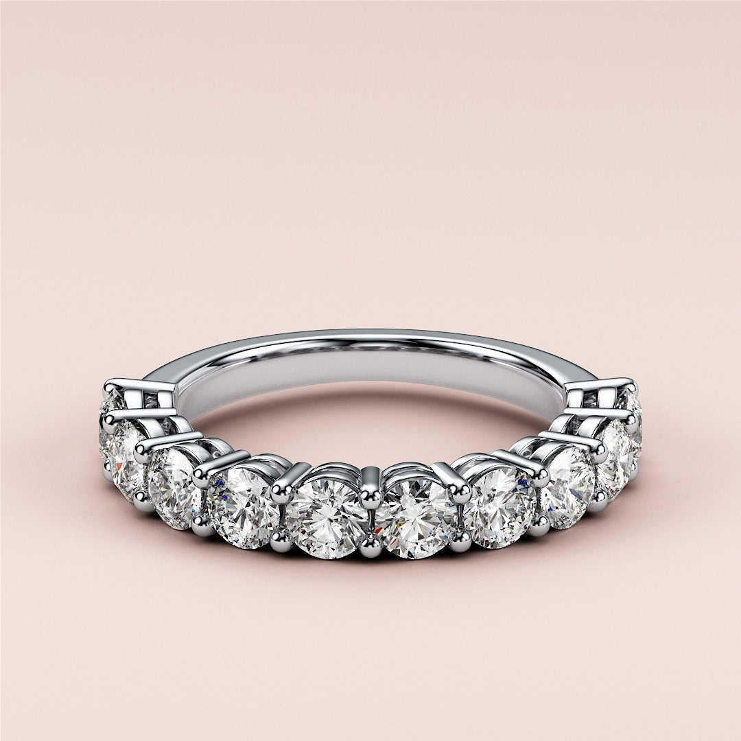 Stunning white gold eternity wedding band with brilliant round-cut diamonds in prong setting, available in 14K, 18K, and platinum. |
 #14KRecycledWhiteGold
 #18KRecycledWhiteGold
 
 
 
 
 #Platinum