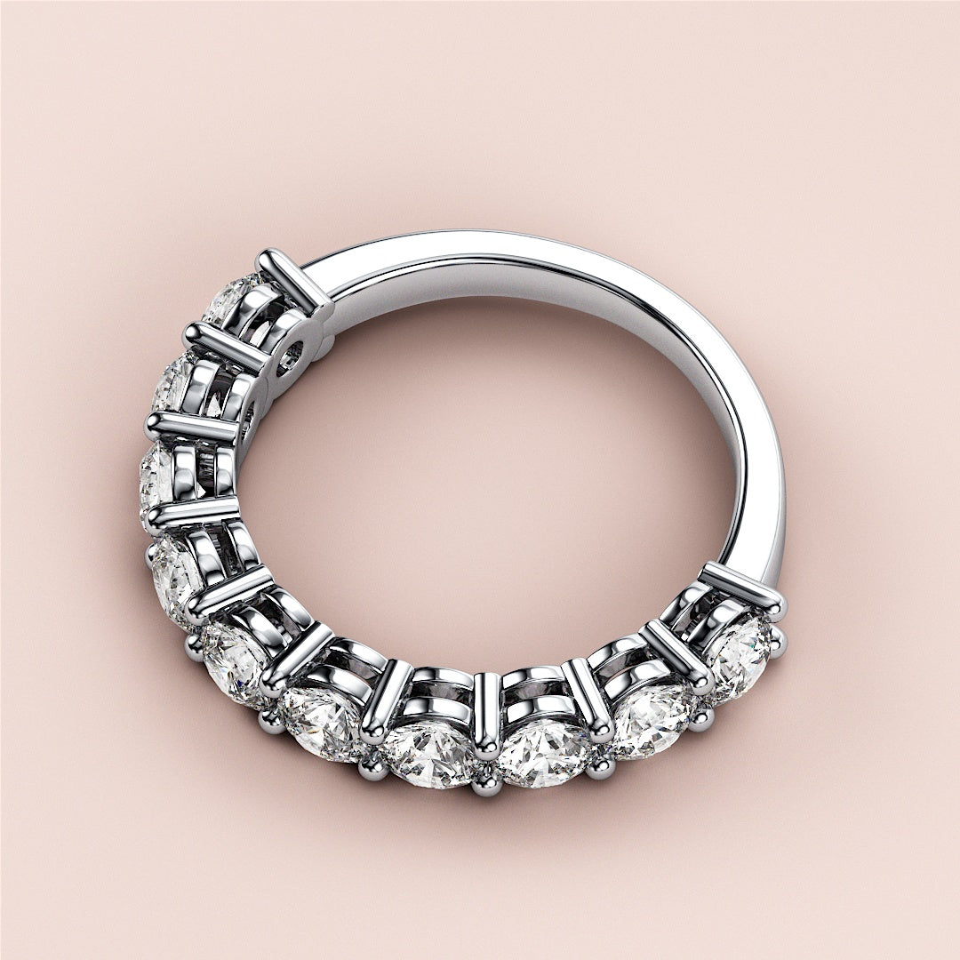 Elegant 14K or 18K white gold eternity wedding band with round-cut diamonds, perfect for everlasting love. |
 #14KRecycledWhiteGold
 #18KRecycledWhiteGold
 
 
 
 
 #Platinum