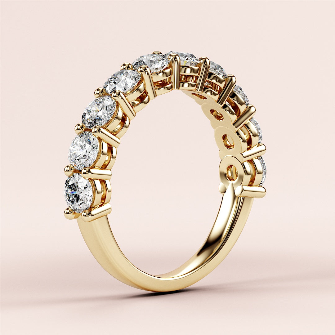 Elegant yellow gold three-quarter eternity wedding band, featuring round brilliant-cut diamonds in 14K/18K or platinum. |
 
 
 #14KRecycledYellowGold
 #18KRecycledYellowGold