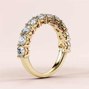 Elegant yellow gold three-quarter eternity wedding band, featuring round brilliant-cut diamonds in 14K/18K or platinum. 