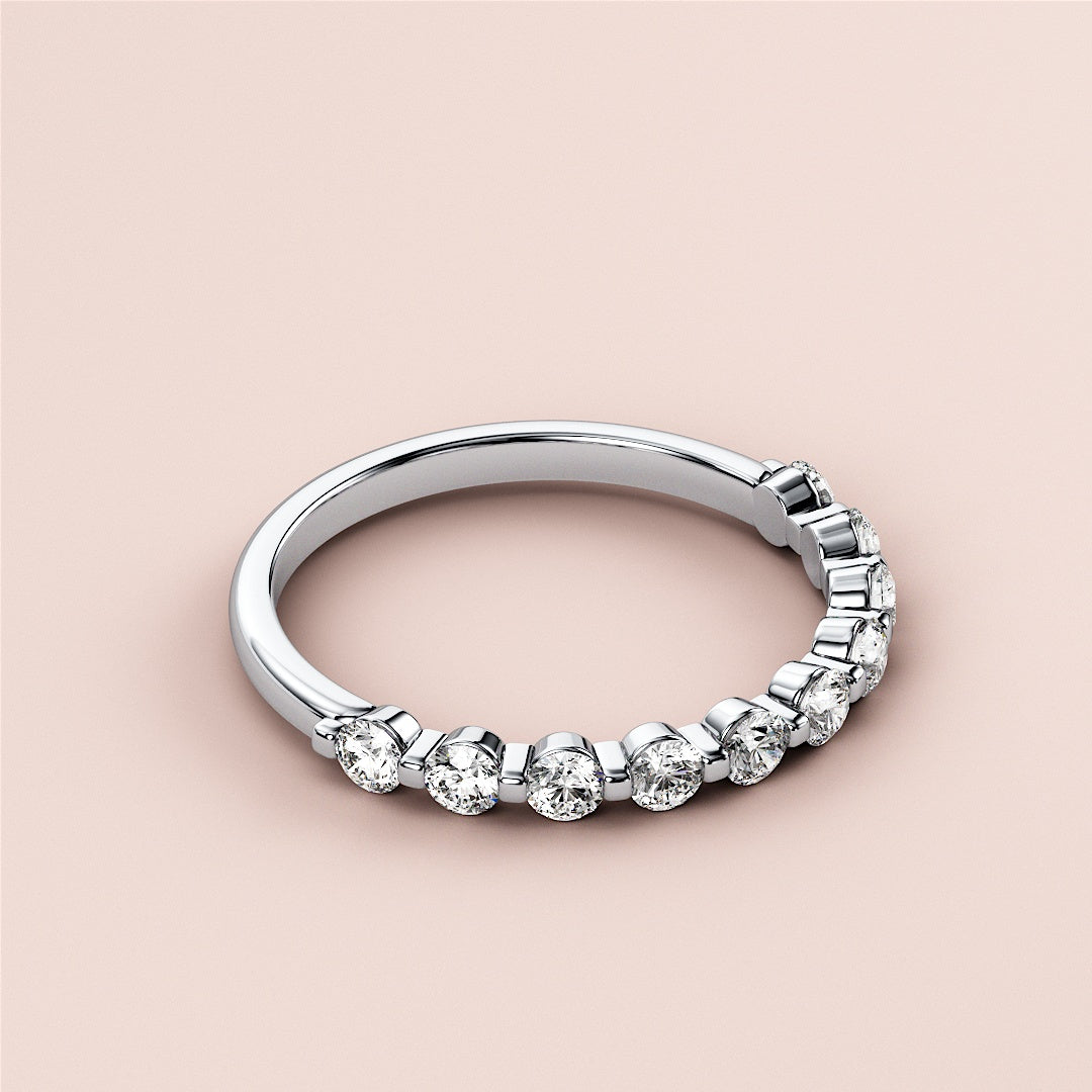 14K or 18K white gold half eternity wedding band with round diamonds, showcasing sparkling gems on a light background. |
 #14KRecycledWhiteGold
 #18KRecycledWhiteGold
 
 
 
 
 #Platinum