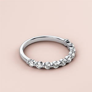14K or 18K white gold half eternity wedding band with round diamonds, showcasing sparkling gems on a light background. 