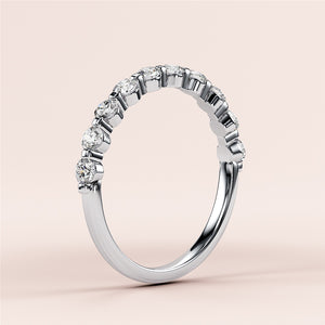 Elegant white gold or platinum half eternity wedding band with round diamonds, available in 14K and 18K for bridal elegance. 