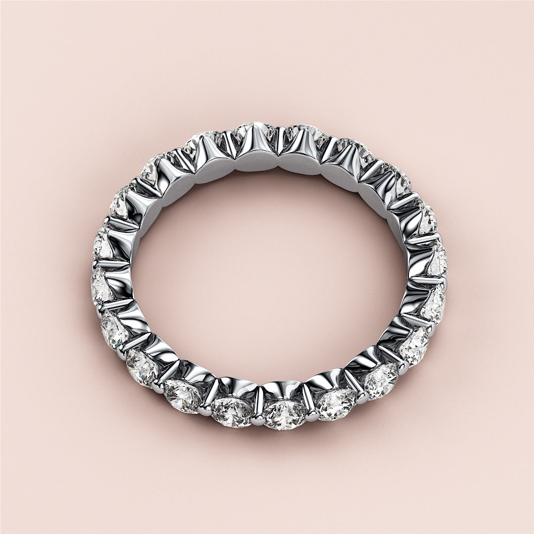 Elegant 14K white gold eternity wedding band with round brilliant-cut diamonds in shared prong setting. |
 #14KRecycledWhiteGold
 #18KRecycledWhiteGold
 
 
 
 
 #Platinum