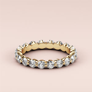 Elegant 14K yellow gold eternity band featuring round-cut diamonds, perfect for wedding celebrations and timeless elegance. 
