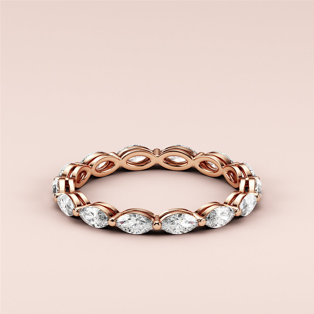 Elegant marquise eternity wedding band with diamonds in 14K or 18K rose gold, perfect for timeless love. |
 
 
 
 
 #14KRecycledRoseGold
 #18KRecycledRoseGold