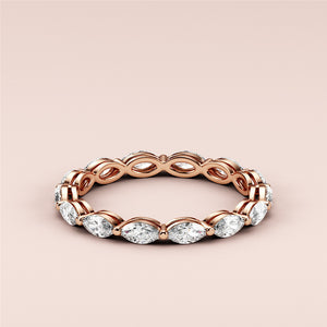 Elegant marquise eternity wedding band with diamonds in 14K or 18K rose gold, perfect for timeless love. 