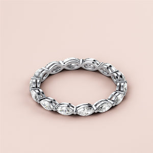Elegant white gold marquise eternity wedding band featuring diamond accents, available in 14K or 18K options. 