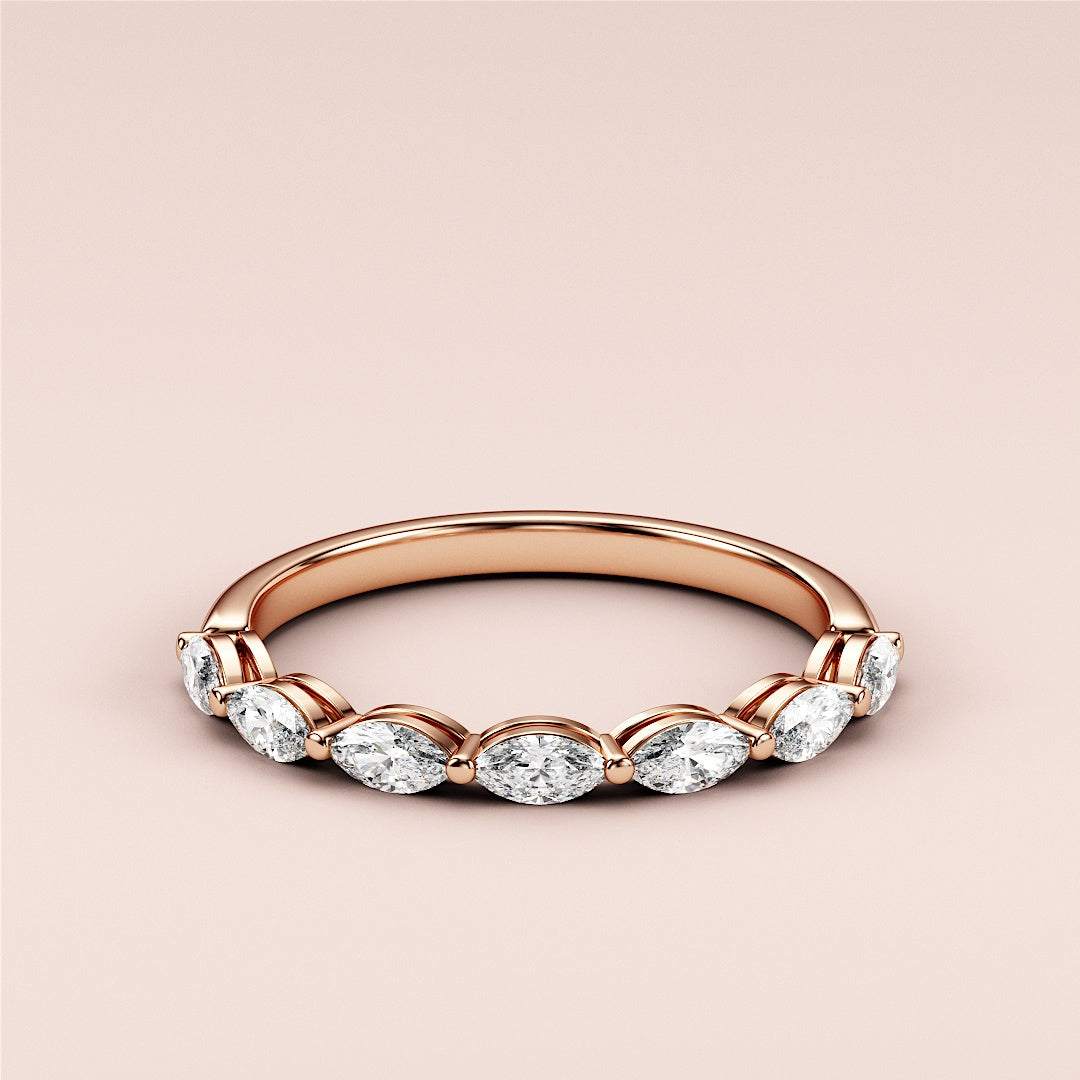 Elegant 14K rose gold eternity band featuring marquise-cut diamonds, perfect for weddings or special occasions. |
 
 
 
 
 #14KRecycledRoseGold
 #18KRecycledRoseGold