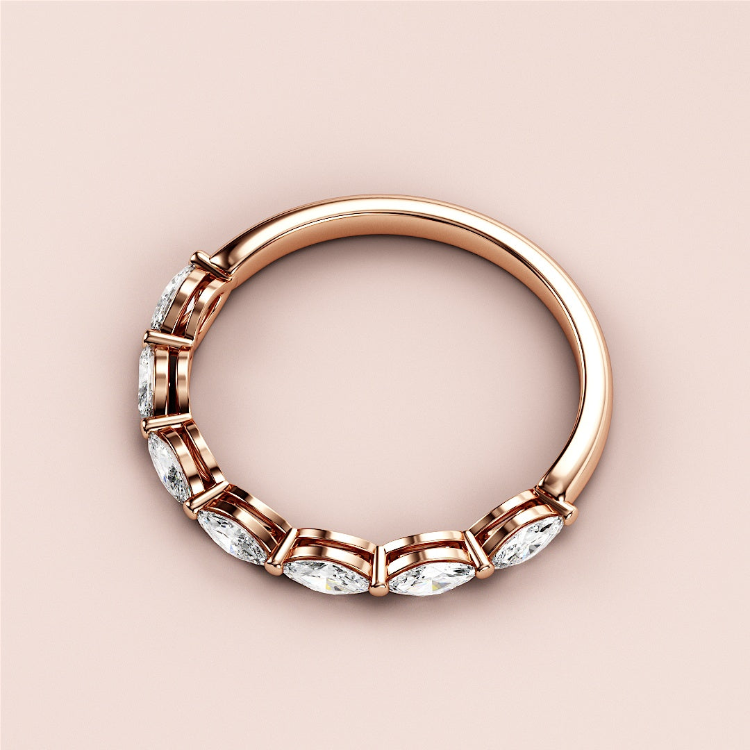 Elegant 14K Rose Gold Marquise-Cut Diamond Wedding Band, showcasing stunning design and craftsmanship. |
 
 
 
 
 #14KRecycledRoseGold
 #18KRecycledRoseGold