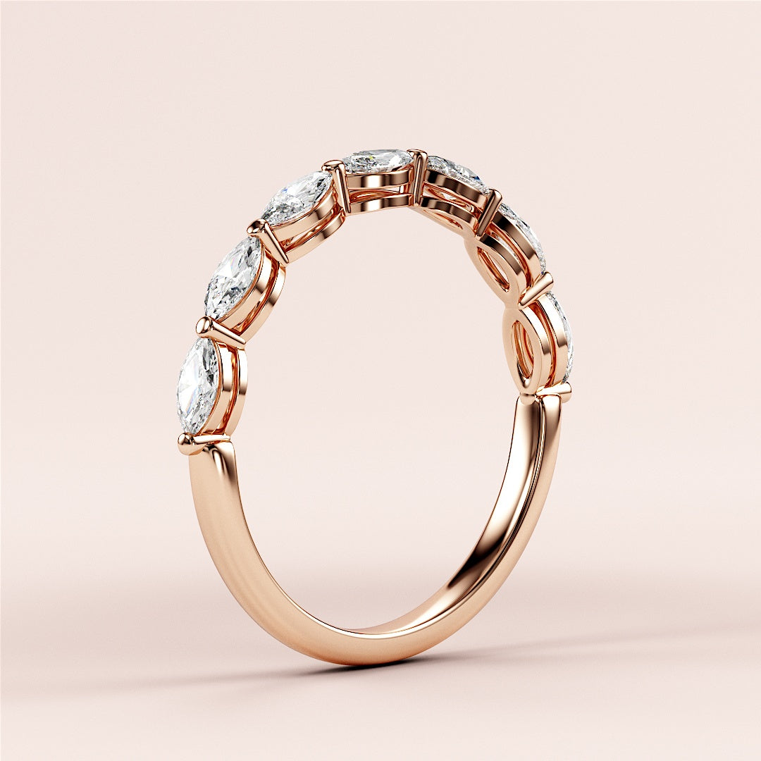 14K and 18K rose gold marquise-cut diamond eternity wedding band, featuring a sleek design and continuous row of dazzling diamonds. |
 
 
 
 
 #14KRecycledRoseGold
 #18KRecycledRoseGold