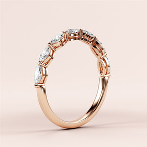 14K and 18K rose gold marquise-cut diamond eternity wedding band, featuring a sleek design and continuous row of dazzling diamonds. 
