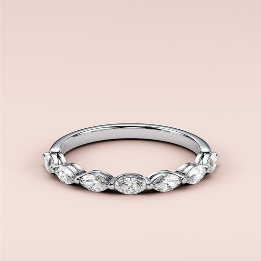Elegant 14K/18K/Platinum marquise half eternity wedding band with diamond accents, showcasing intricate design details. 